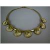 Image 1 : A 14KT YELLOW GOLD CHOKER NECKLACE, with 7 scallo