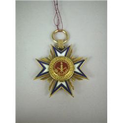 A YELLOW GOLD AND BLUE AND WHITE ENAMEL STAR-FORM