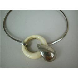 A SILVER-PLATED AND BONE CHOKER NECKLACE