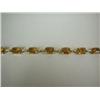 Image 1 : A YELLOW GOLD AND CITRINE QUARTZ BRACELET, 6"l