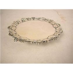 AN ENGLISH SILVER SALVER Hallmarked, maker R.R, w