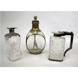 THREE GLASS AND METAL MOUNTED VESSELS