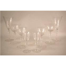 A GROUP OF COLORLESS ETCHED FLORAL GLASSWARE Incl