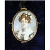 Image 1 : A MINIATURE PORTRAIT ON IVORY OF A CURLY-HAIRED W