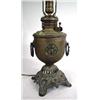 Image 1 : A VICTORIAN BRASS FLUID LAMP