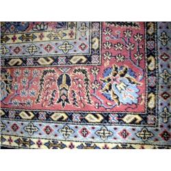 A TURKISH ORIENTAL WOOL CARPET