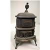 Image 1 : A CAST-IRON FLORAL DECORATED PARLOR STOVE Rosedal