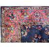 Image 1 : A PERSIAN STYLE ORIENTAL RUG With a dark blue cen