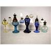 Image 1 : AN ASSORTED GROUP OF COLORED GLASS FLUID LAMPS Pr