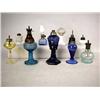 Image 1 : AN ASSORTED GROUP OF COLORED GLASS FLUID LAMPS Pr