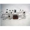 Image 1 : AN ASSORTED GROUP OF COLORLESS GLASS FLUID LAMPS 