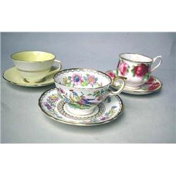 A GROUP OF TWENTY-FOUR BONE CHINA FLORAL DECORATE