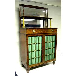 A REGENCY PARCEL-GILT MAHOGANY BOOKCASE CABINET, 