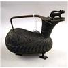 Image 1 : A BRASS EMBOSSED EWER