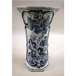 A BLUE DECORATED DELFT STYLE VASE