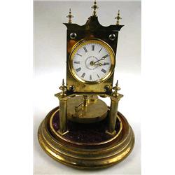 A BRASS 400 DAY CLOCK