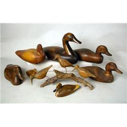 AN ASSORTED GROUP OF WOOD DECOY CARVINGS All lack