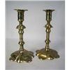 Image 1 : A PAIR OF CAST-BRASS PETAL-BASED CANDLESTICKS pro