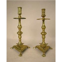 A PAIR OF CAST-BRASS FOOTED TRIANGULAR-BASED CAND