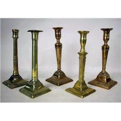 A GROUP OF FIVE CAST-BRASS COLUMNAR SQUARE-BASED 