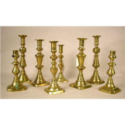 FOUR PAIR OF CAST-BRASS OCTAGONAL-BASED CANDLESTI