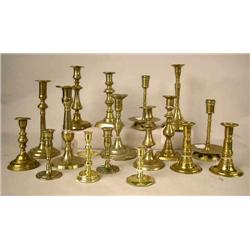 A GROUP OF FIFTEEN ASSORTED CAST-BRASS CANDLESTIC