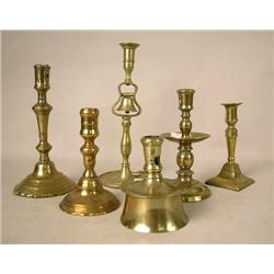 A GROUP OF SIX ASSORTED CAST-BRASS CANDLESTICKS i