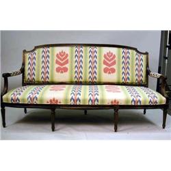 A LOUIS XVI STYLE MAHOGANIZED SETTEE