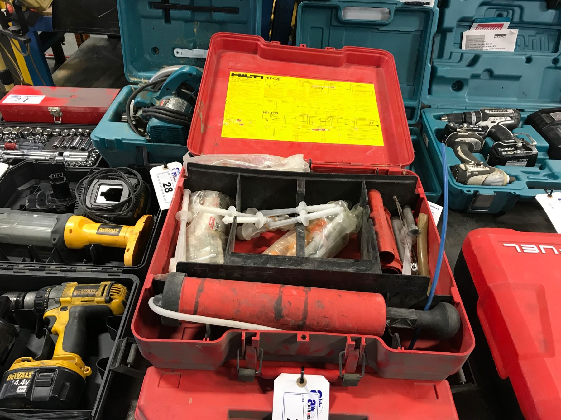 2 CASES OF ASSORTED HILTI COMPOUND GUNS