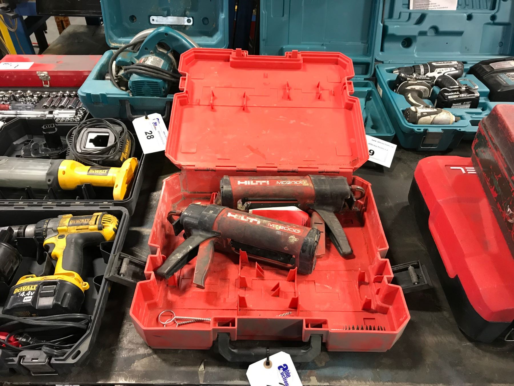 2 CASES OF ASSORTED HILTI COMPOUND GUNS