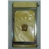 Image 1 : Chrome and celluloid compact with military insign