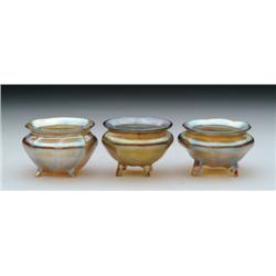 THREE TIFFANY FOOTED SALTS