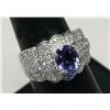 Image 1 : TANZANITE AND DIAMOND RING