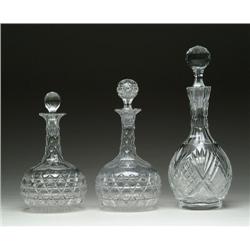 THREE CUT GLASS DECANTERS