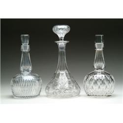 THREE CUT GLASS DECANTERS