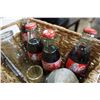 Image 2 : SMALL RATTAN BASKET W/ 4 COLLECTOR COKE BOTTLES, 3 ANTIQUE BOTTLES, AND SILVER PICTURE FRAME