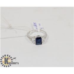 STERLING SILVER BLUE SAPPHIRE RING SIZE 7.