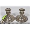 PAIR OF SILVER PLATED CANDLE STICK HOLDERS.