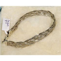 7" STERLING SILVER BRACELET.