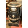 Image 1 : VINTAGE ORNATE WOOD BURNING STOVE
