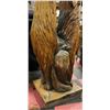 Image 4 : 2 HOWLING WOLVES HAND CARVED FROM A SINGLE TREE