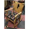 Image 1 : ANTIQUE WOOD ROCKING CHAIR W/COWBOY MOTIF -