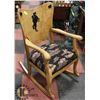 Image 2 : ANTIQUE WOOD ROCKING CHAIR W/COWBOY MOTIF -