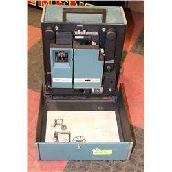 BELL AND HOWELL 16MM PROJECTOR WITH LENSE