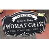 Image 1 : LARGE METAL WOMAN CAVE SIGN