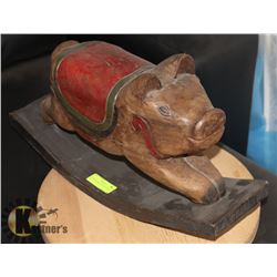 ANTIQUE HAND CARVED ROCKING PIG.