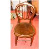 Image 1 : ANTIQUE WOOD CHAIR WITH ORNATE DESIGN