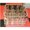 Image 1 : METAL HOLDER WITH 12 ANTIQUE MILK BOTTLES