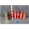 Image 1 : (7) Aluminum Coke Bottles (4 full)