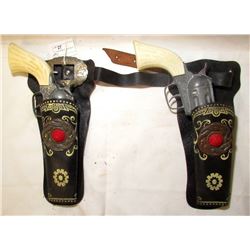 2 VINTAGE PONY BOY TOY CAP GUNS WITH HOLSTERS